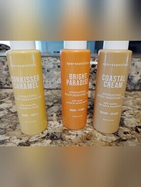 Spa scentials Hydrating body perfume oil set of 3 . All new